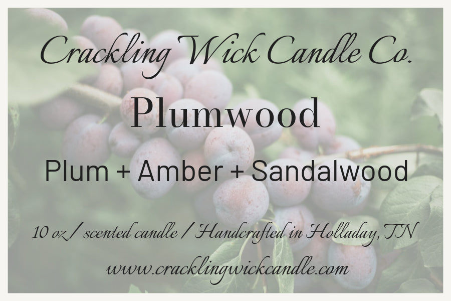 Plumwood scented candle label with Crackling Wick Candle Co. logo and scent notes