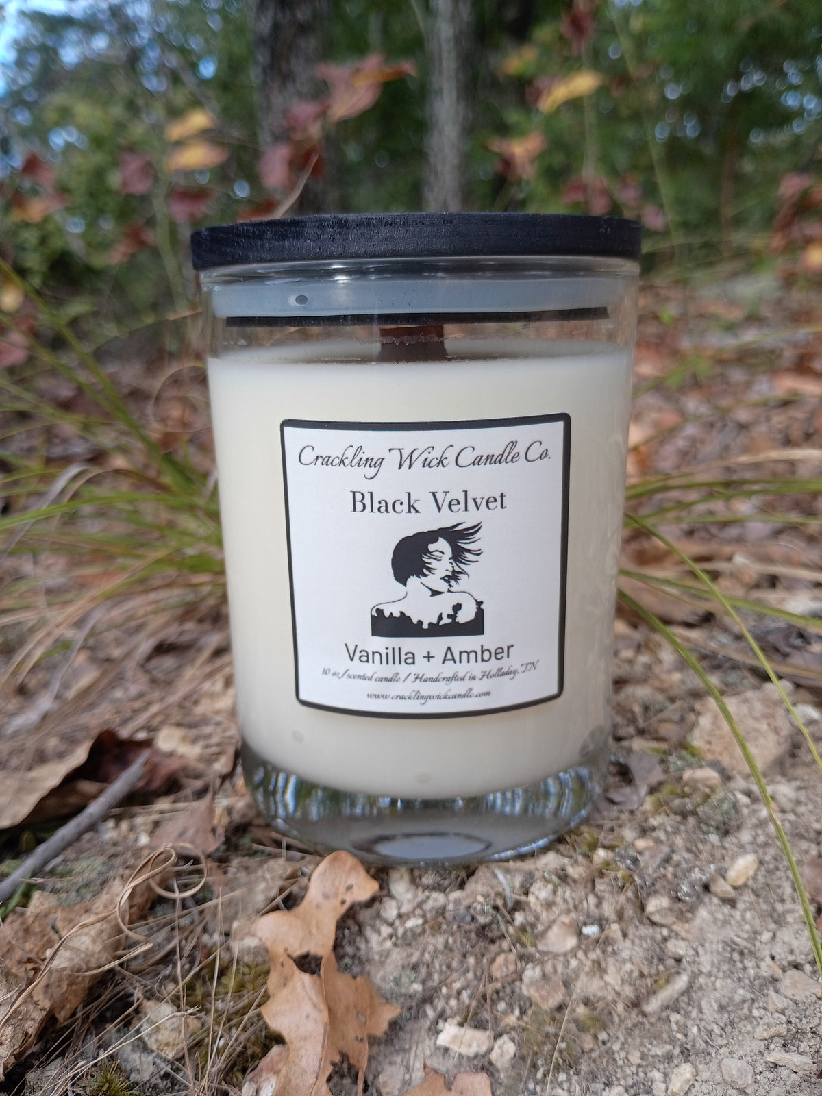 Black-lidded candle jar with "Black Velvet" label, white wax visible through top
